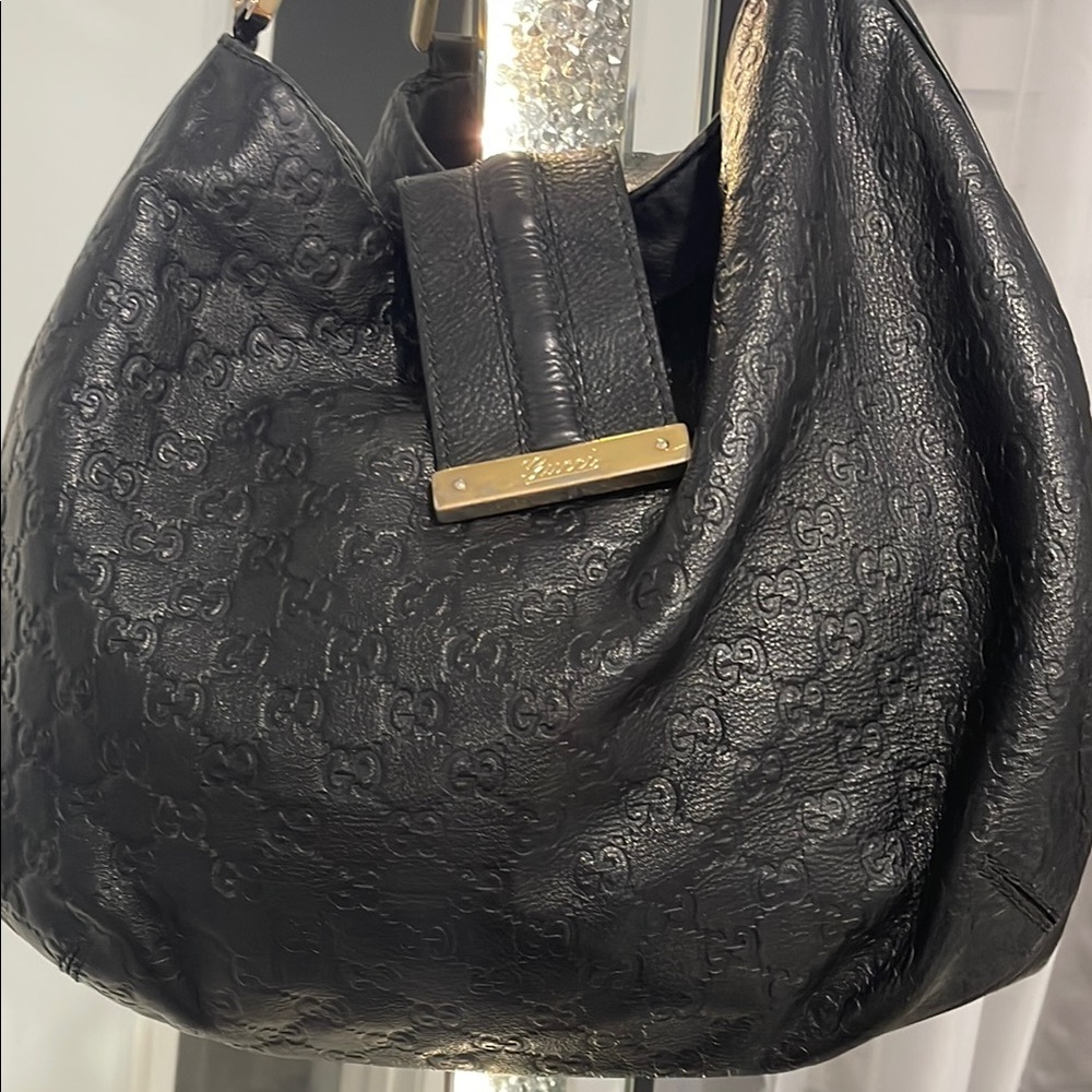 Gucci Black Leather Hobo Bag with Embossed Monogram